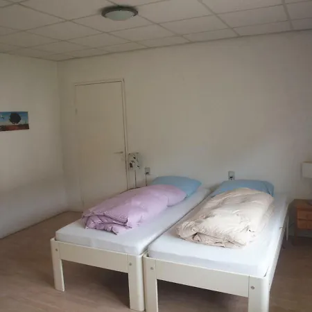 De Buurvrouw Prázdninový dům